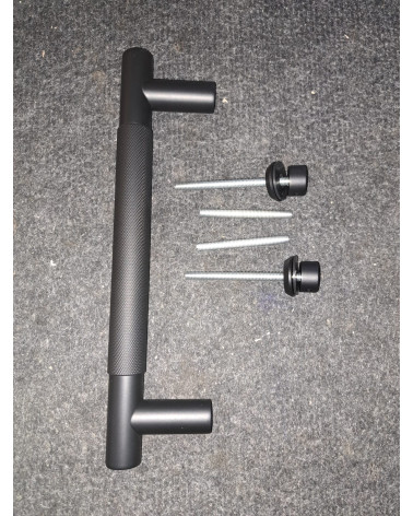 Textured single pull handle for door 1770 anthracite finish designer handle fitted on a grey surface