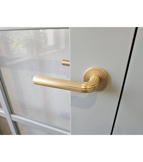Satin brass Frella door handle designer handle