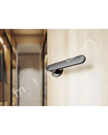 Black ALORA door handle designer handle bottom view mounted on a door