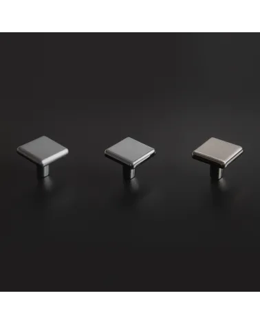 Titanium furniture knob NOX design handle arranged on a dark background