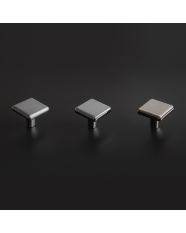 Titanium furniture knob NOX design handle arranged on a dark background