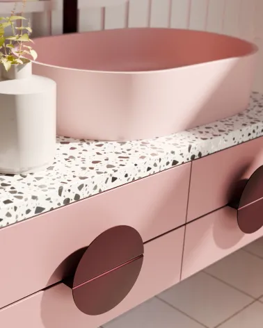 ZORIA burgundy designer handle designer handle mounted on a pink bathroom cabinet