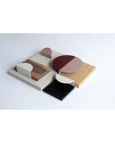 ZORIA furniture handle designer handles displayed on a contrasting textured background