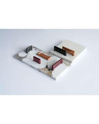 NOX-1 furniture handle designer handle presented on plates