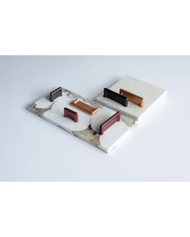 NOX-1 furniture handle designer handle presented on plates
