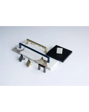 NOX furniture knob designer handle presented on plates