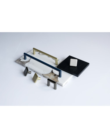 NOX furniture knob designer handle presented on plates