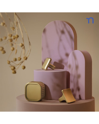 Matt gold NOX furniture knob designer handle arranged with decorative materials