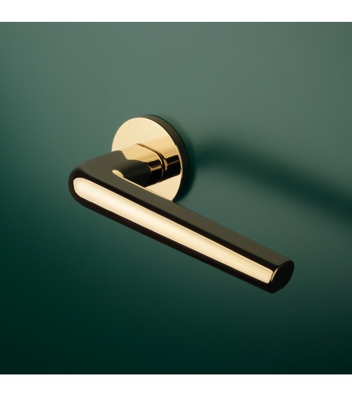 FUNKIA polished gold designer door handle