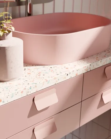 Powder pink SEA furniture handle design handle fitted on a bathroom unit