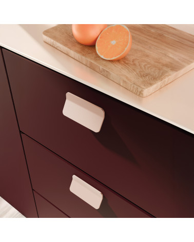 Powder pink SEA furniture handle design handle fitted on a unit