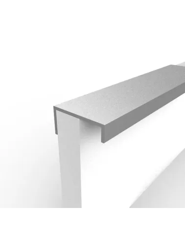 VERA polished chrome furniture handle designer handle fixed to the edge of a white panel