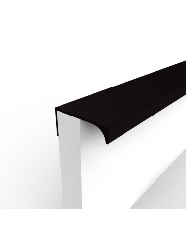Black anodised TERRA furniture handle designer handle fixed to the edge of a white panel