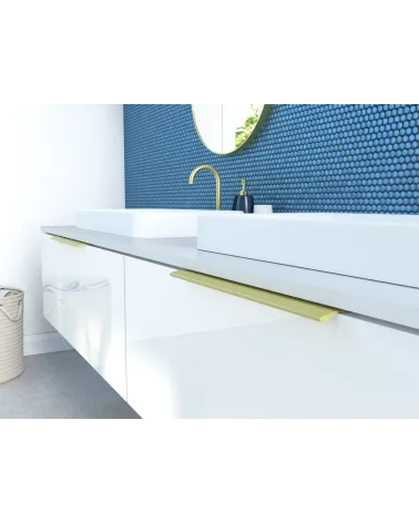 Gold anode furniture handle COSTA design handle mounted on a bathroom cabinet