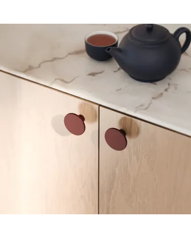 Burgundy ASTRO furniture knob designer handle mounted on furniture