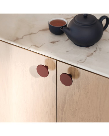 Burgundy ASTRO furniture knob designer handle mounted on furniture
