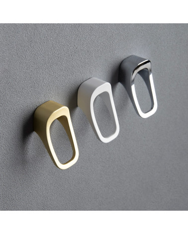LAGO furniture knob designer handle fixed on a textured background