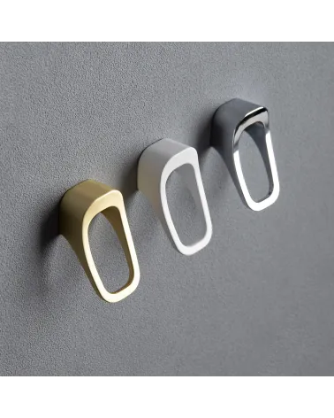 LAGO furniture knob designer handle fixed on a textured background
