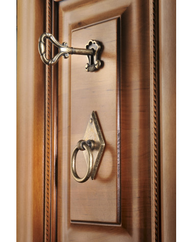 MARS patinated brass furniture knob designer handle mounted on wooden furniture