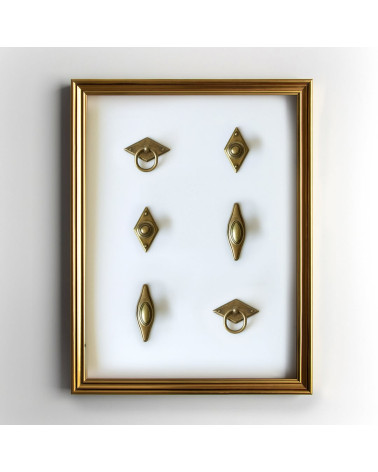MARS furniture knob designer handle placed in a frame