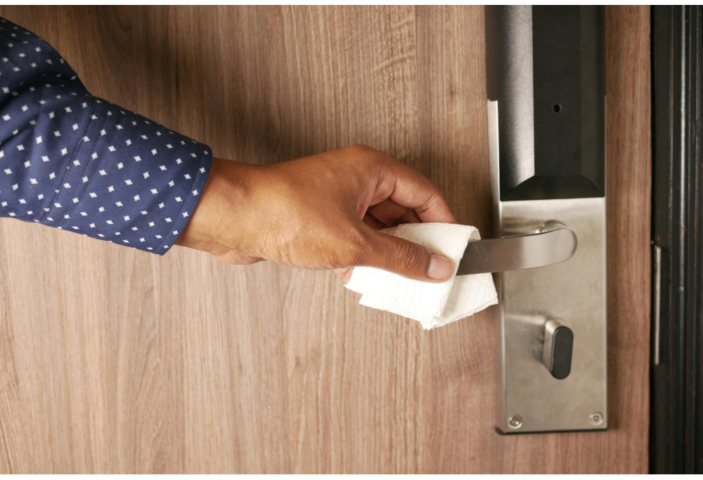 Which materials should you prioritise to limit the spread of germs on door handles?