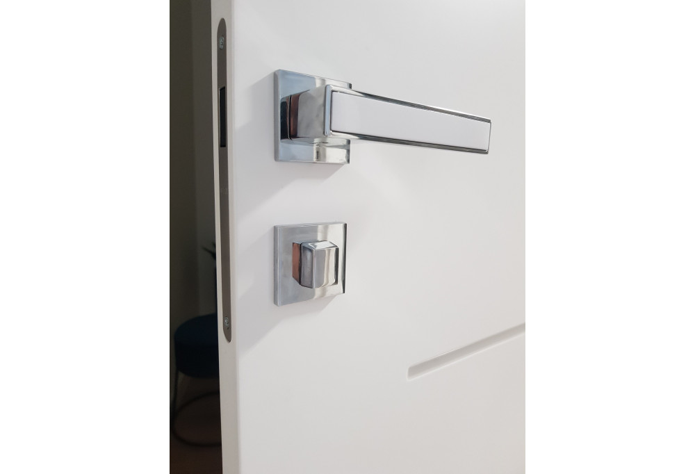What is a door handle mounted on an escutcheon?